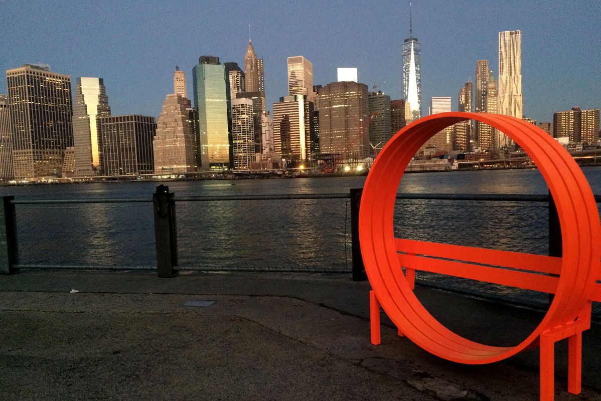 01-2 Red Sculpture By Danish Artist Jeppe Hein At Brooklyn Heights With East River And New York Financial District Skyline At Dawn From Brooklyn Heights
